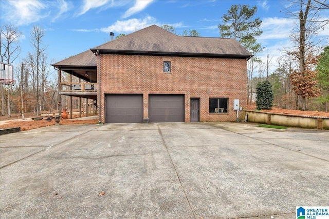 view of property exterior featuring a garage