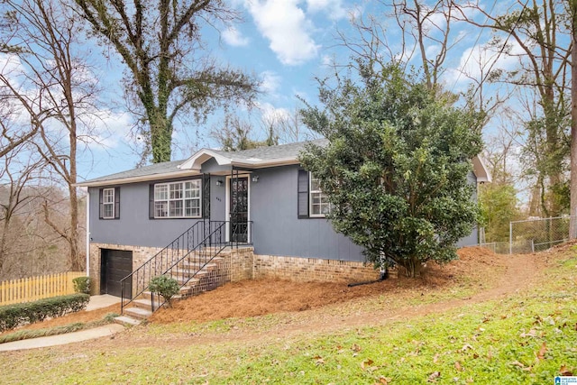 view of front of property featuring a garage