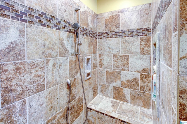 room details with a tile shower