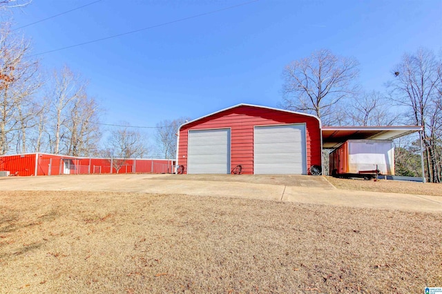 garage featuring a carport