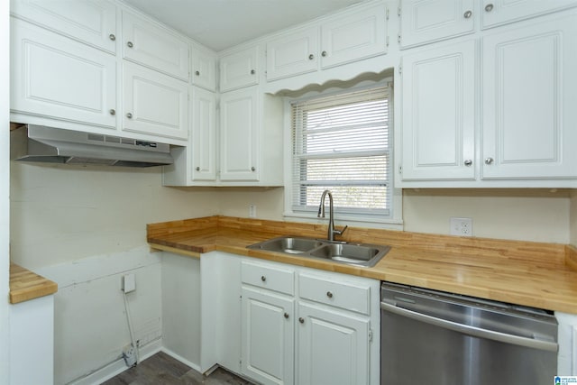 kitchen featuring butcher block countertops, sink, white cabinets, and dishwasher