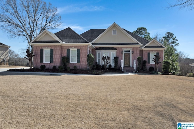 single story home with a front yard