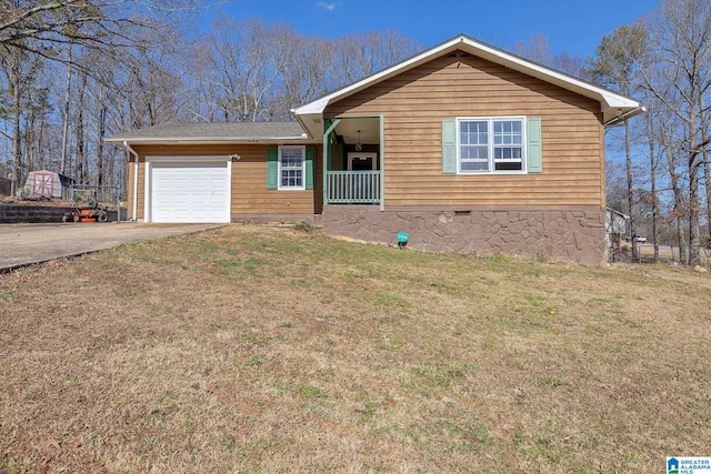 view of front of house featuring a garage and a front yard