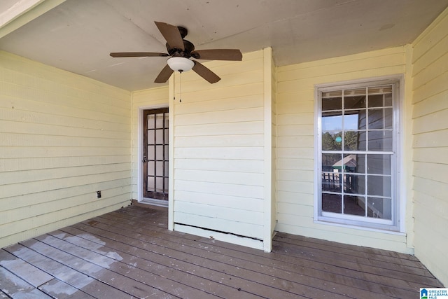 wooden terrace with ceiling fan