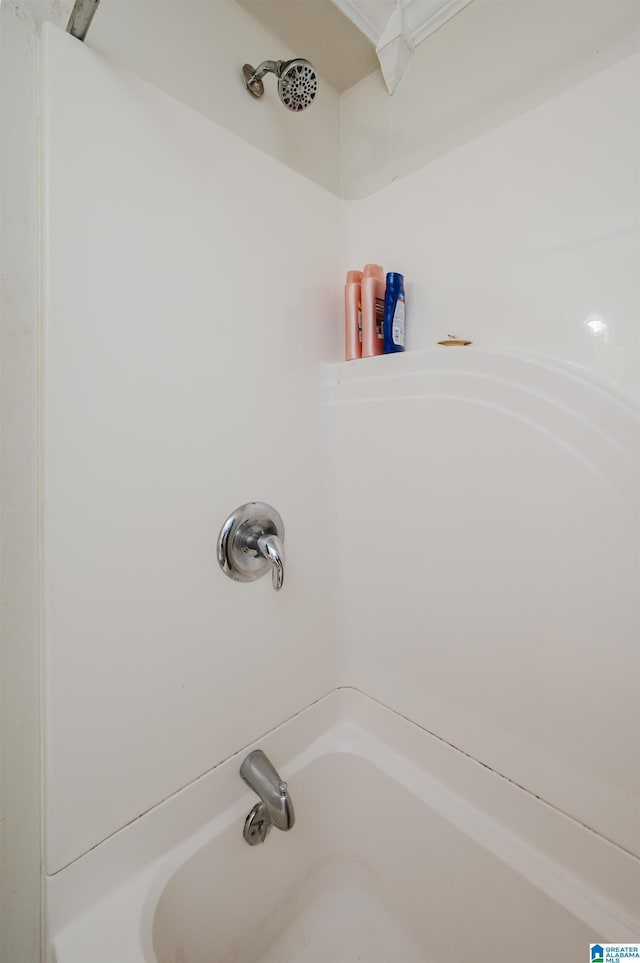 bathroom with shower / bathtub combination