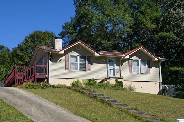 view of front facade with a front lawn