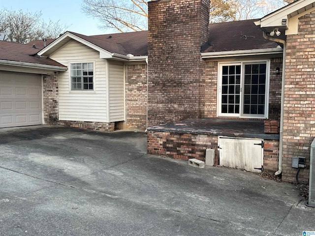 view of patio / terrace with a garage