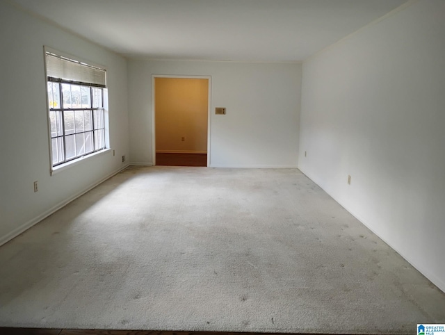 empty room featuring carpet flooring