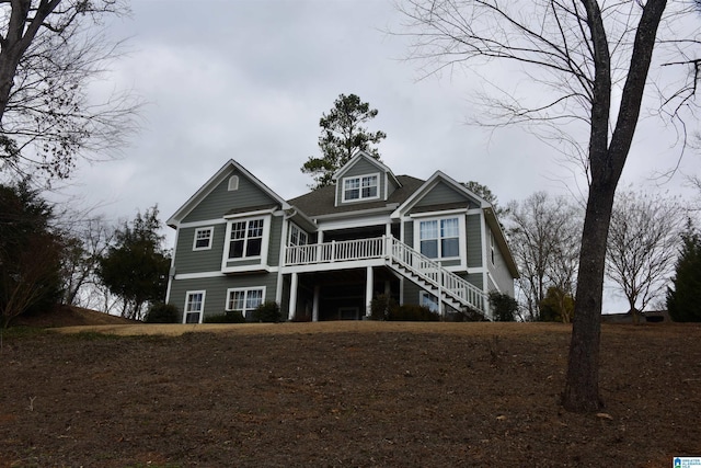 view of front of house featuring stairway