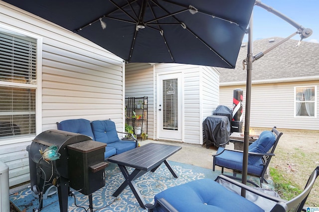 view of patio / terrace featuring an outdoor living space and grilling area