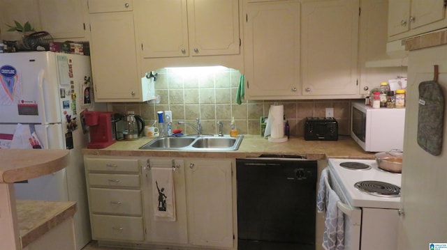 kitchen with white cabinetry, sink, white appliances, and decorative backsplash