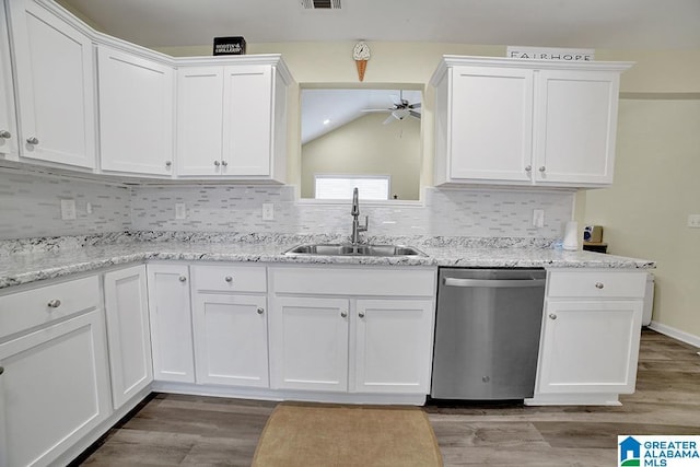 kitchen featuring sink, white cabinets, dishwasher, and light wood-type flooring