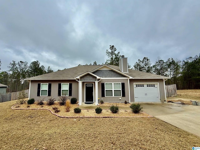 view of front facade with a garage and a front yard