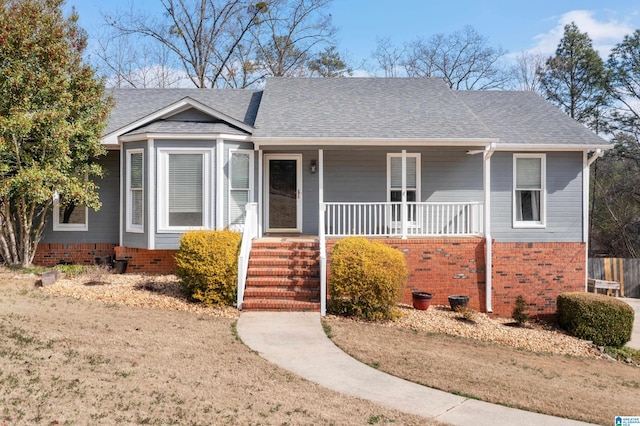 ranch-style home featuring a porch