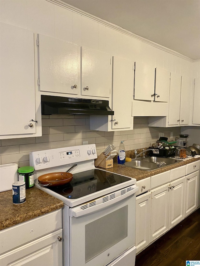 kitchen with dark hardwood / wood-style floors, sink, white cabinets, backsplash, and electric range