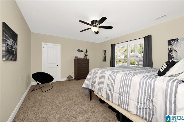 bedroom with light carpet and ceiling fan