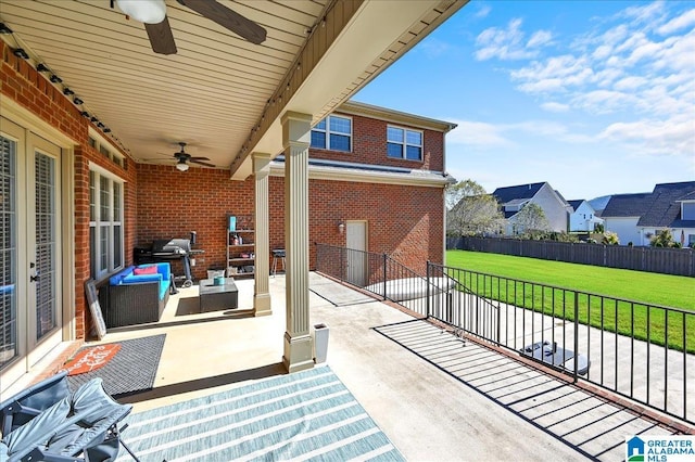 view of patio featuring an outdoor living space, a grill, and ceiling fan