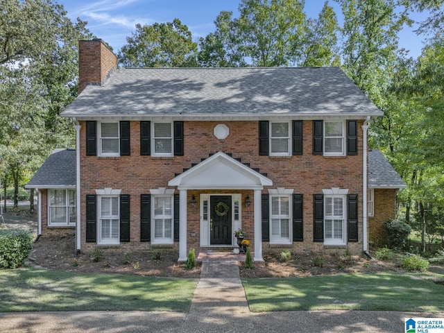 colonial house with a front yard