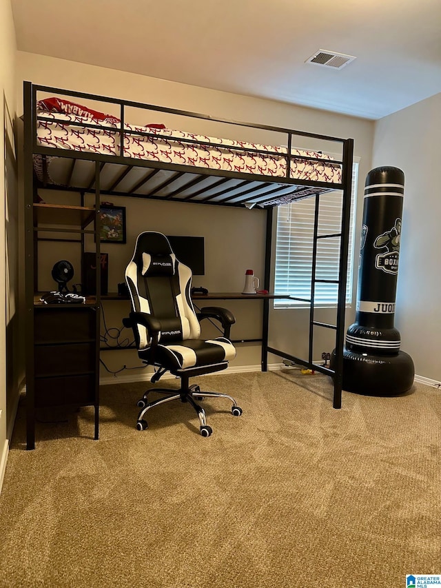 bedroom with carpet, visible vents, and baseboards