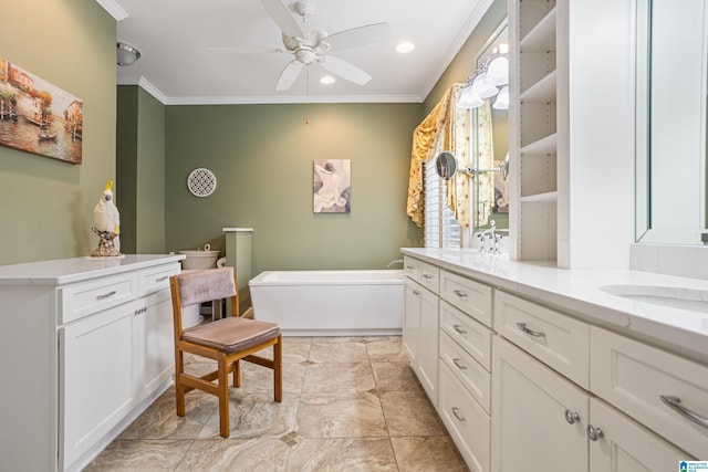 bathroom with crown molding, vanity, ceiling fan, and a tub to relax in