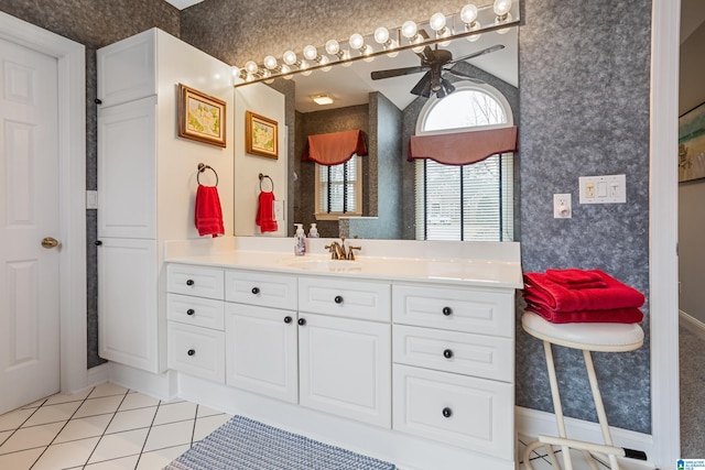 bathroom featuring ceiling fan, tile patterned floors, and vanity