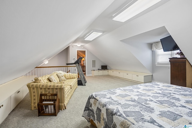 carpeted bedroom featuring lofted ceiling