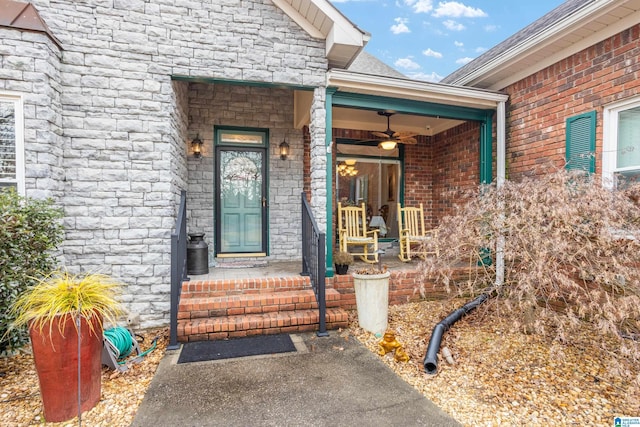 entrance to property featuring ceiling fan