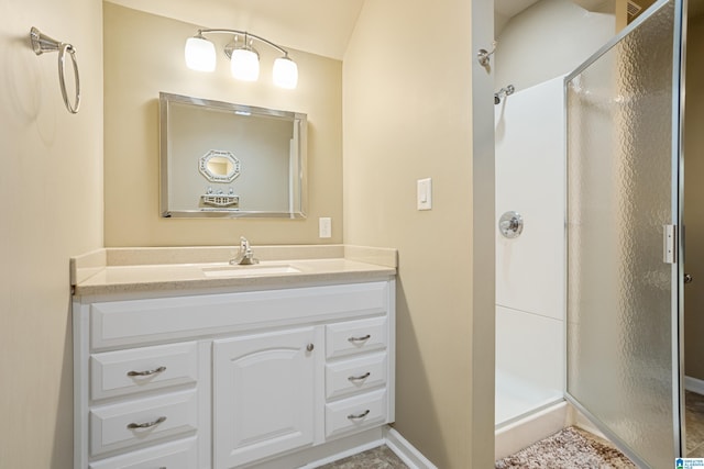 bathroom with vanity and an enclosed shower