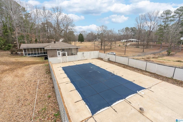 view of pool featuring a patio, fence, and a fenced in pool