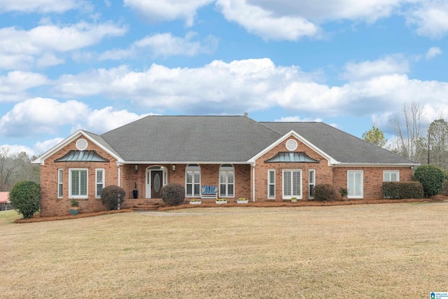 ranch-style home with a front yard