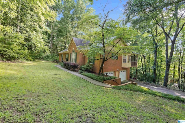 view of home's exterior featuring a garage and a yard