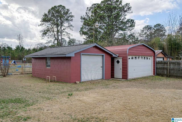 garage with a lawn