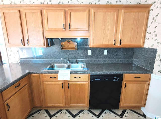 kitchen featuring tasteful backsplash, sink, and dishwasher