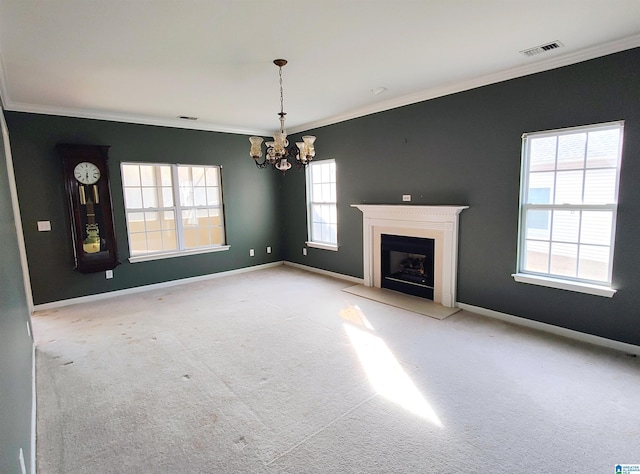 unfurnished living room featuring a notable chandelier, light colored carpet, and ornamental molding