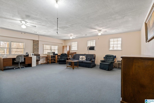 living room with light colored carpet, plenty of natural light, and a textured ceiling