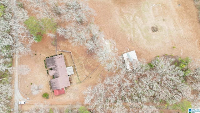 birds eye view of property with a rural view