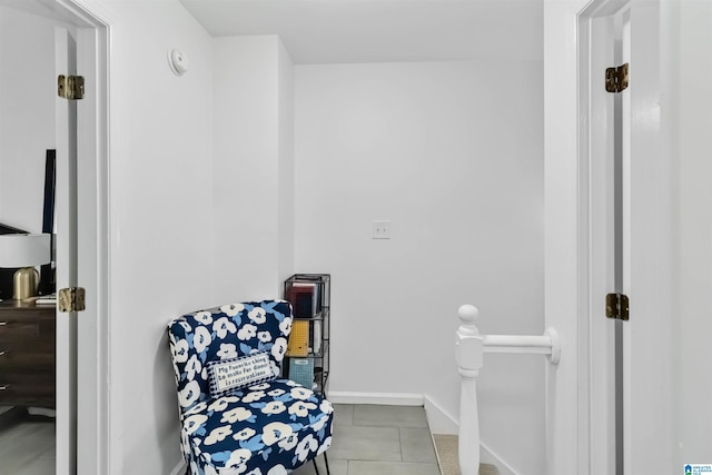 sitting room featuring light tile patterned floors