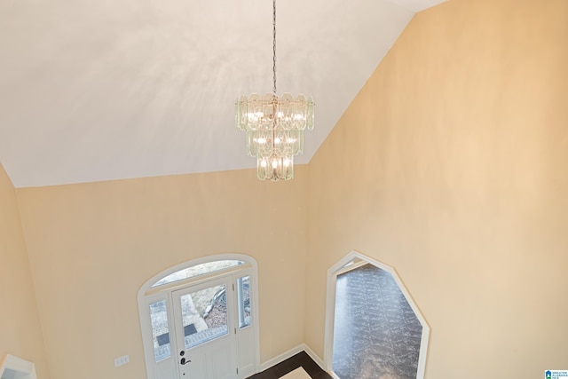 interior details featuring a notable chandelier