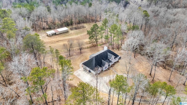 birds eye view of property with a rural view