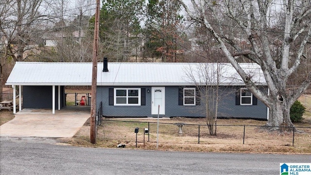 ranch-style home with a carport