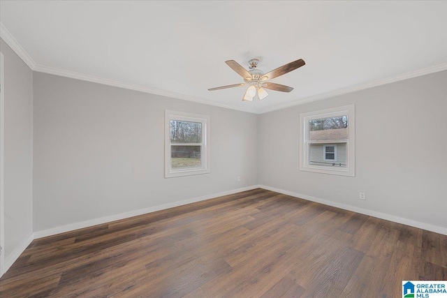 empty room featuring dark hardwood / wood-style flooring, crown molding, plenty of natural light, and ceiling fan