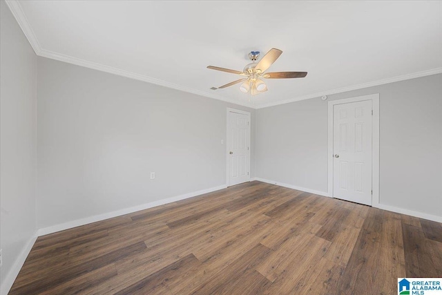 empty room with ceiling fan, ornamental molding, and dark hardwood / wood-style flooring