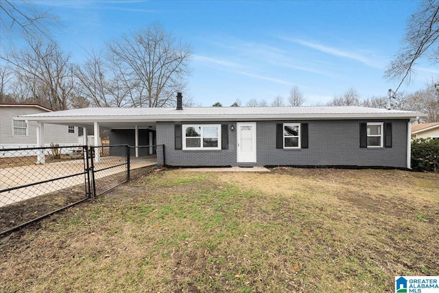 ranch-style home featuring a carport and a front yard