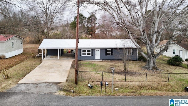 single story home with a carport