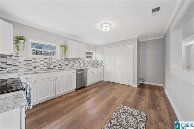 kitchen featuring white cabinetry, dishwasher, sink, and ornamental molding