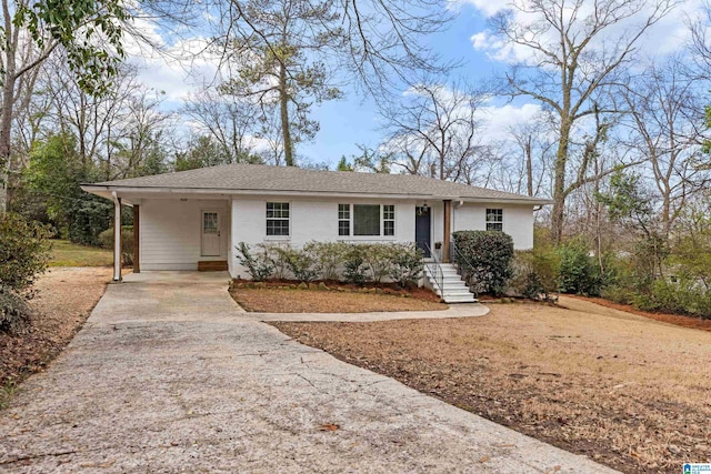 view of front of home with a carport