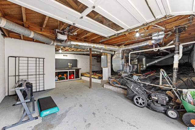 garage featuring a garage door opener and electric panel