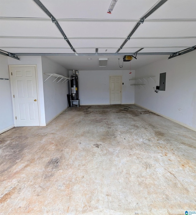 garage featuring electric panel, water heater, and a garage door opener