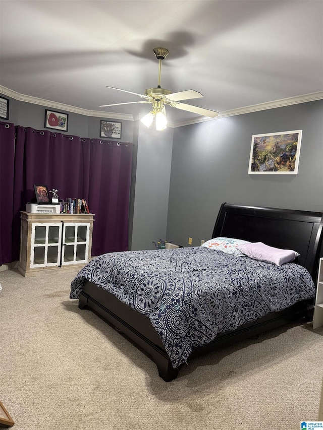 bedroom featuring ceiling fan, ornamental molding, and carpet