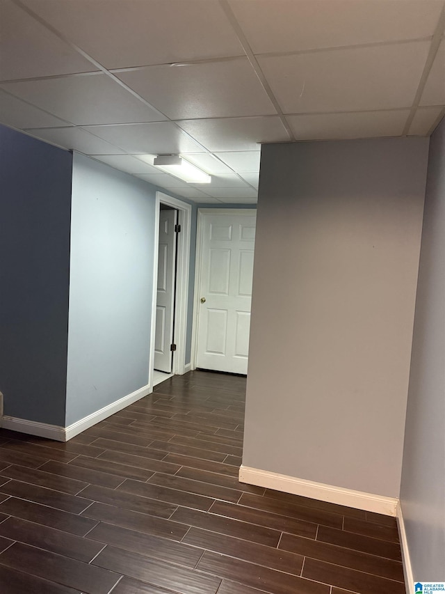 unfurnished room with a paneled ceiling